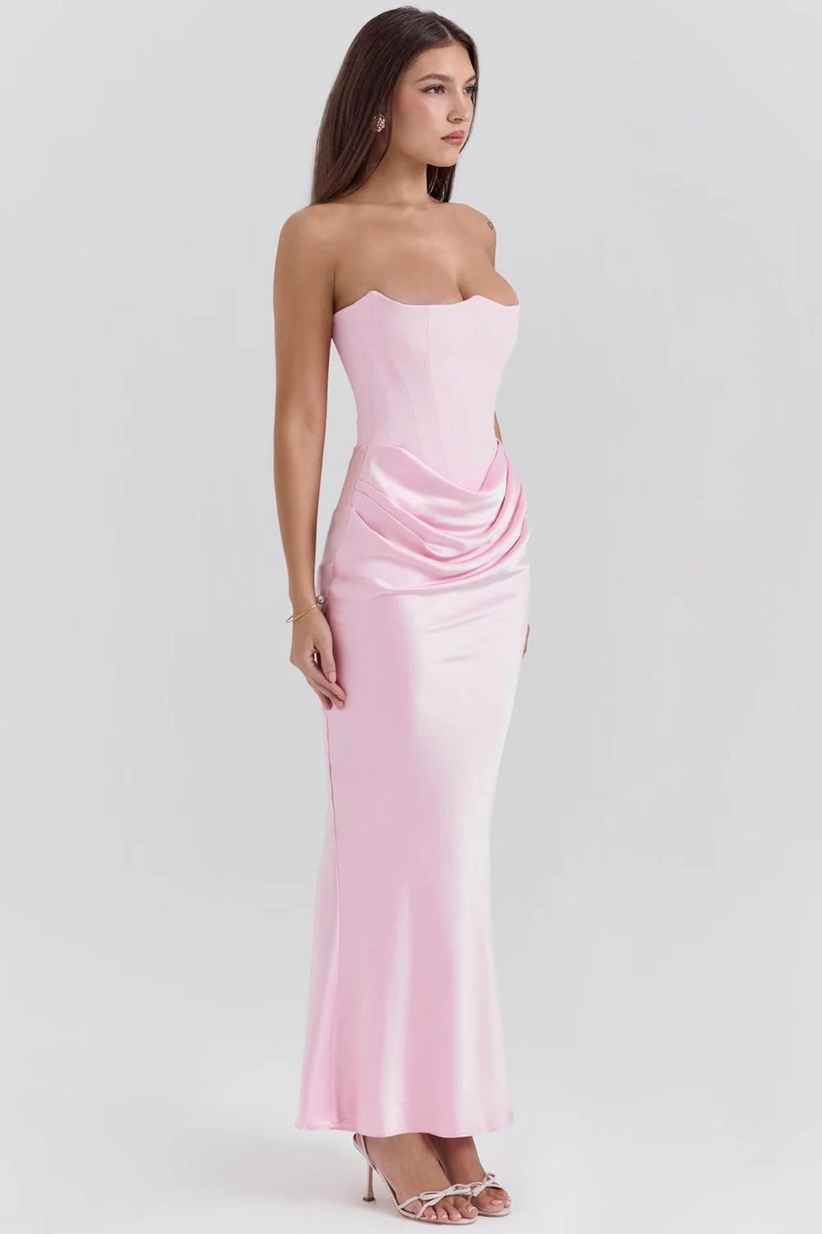 Strapless lace evening dress with flowing skirt, structured bodice.