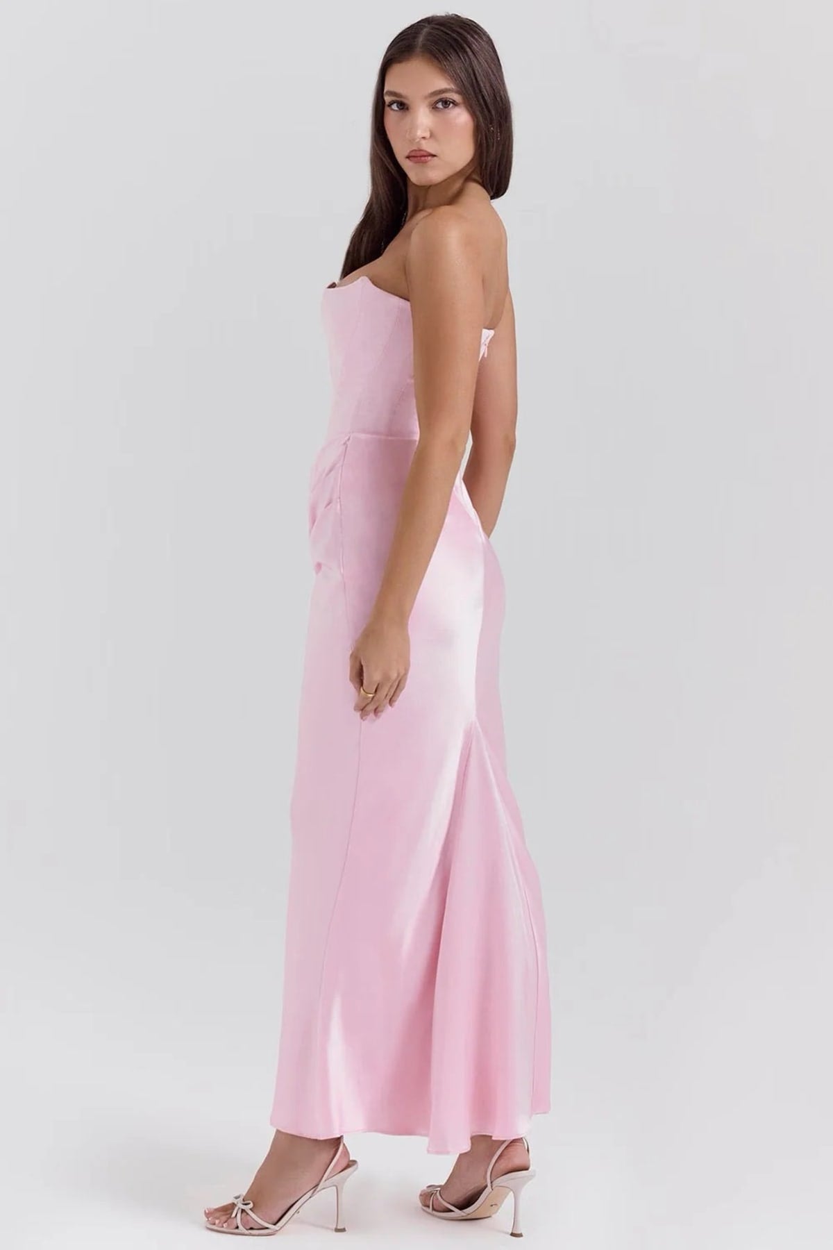 Strapless lace evening dress with flowing skirt, structured bodice.