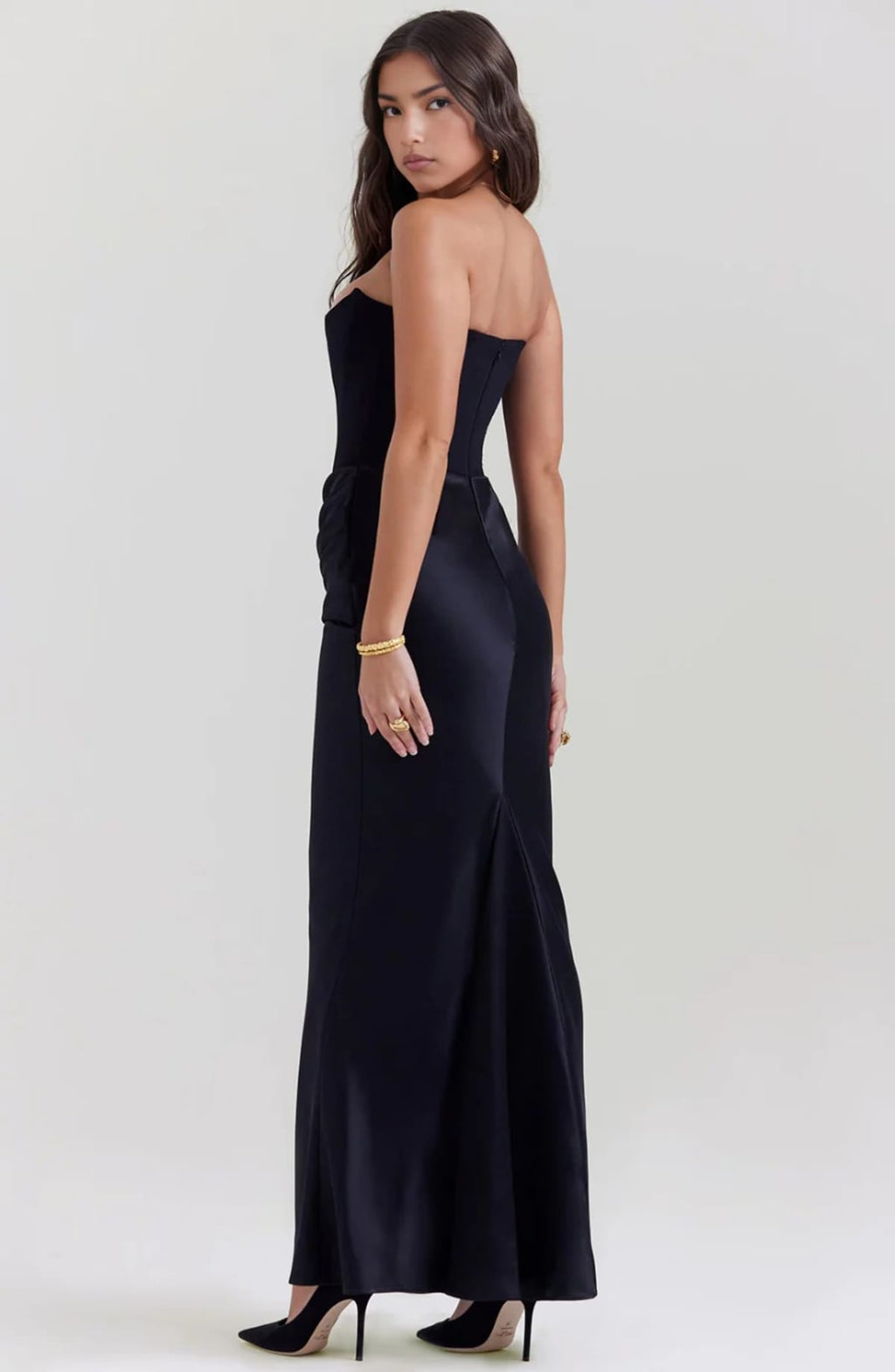 Strapless lace evening dress with flowing skirt, structured bodice.