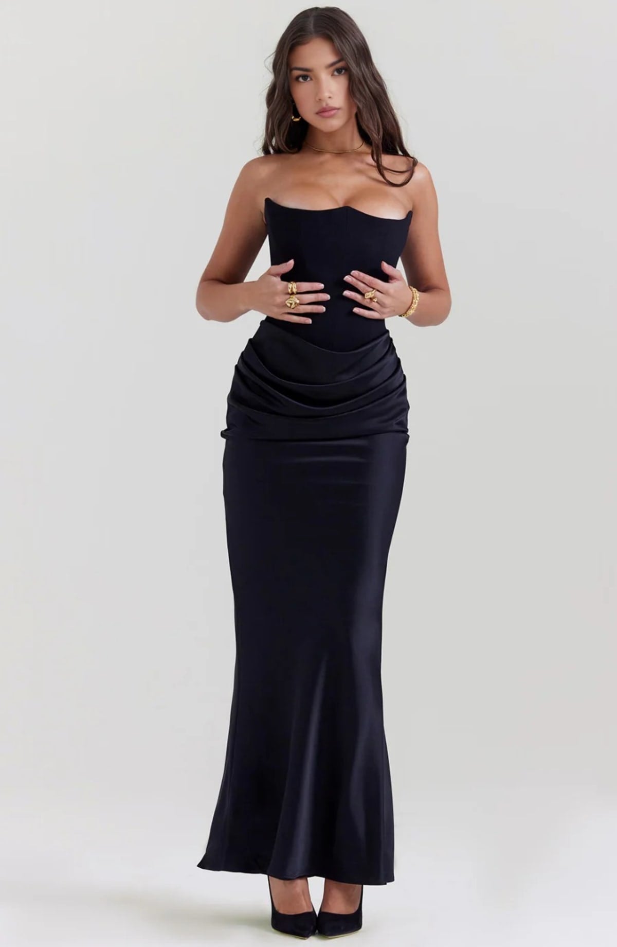 Strapless lace evening dress with flowing skirt, structured bodice.