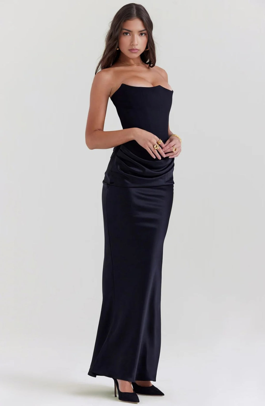 Strapless lace evening dress with flowing skirt, structured bodice.