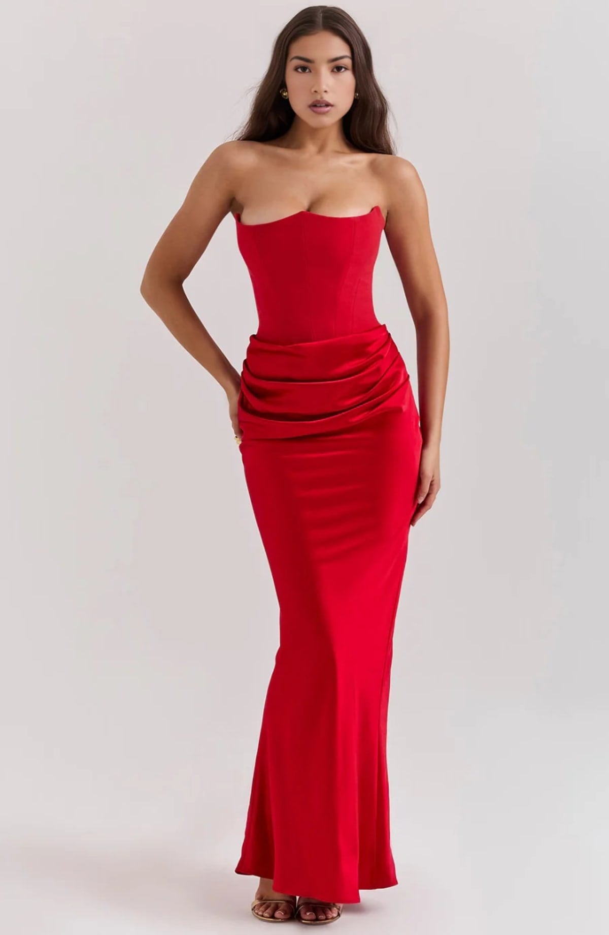 Strapless lace evening dress with flowing skirt, structured bodice.