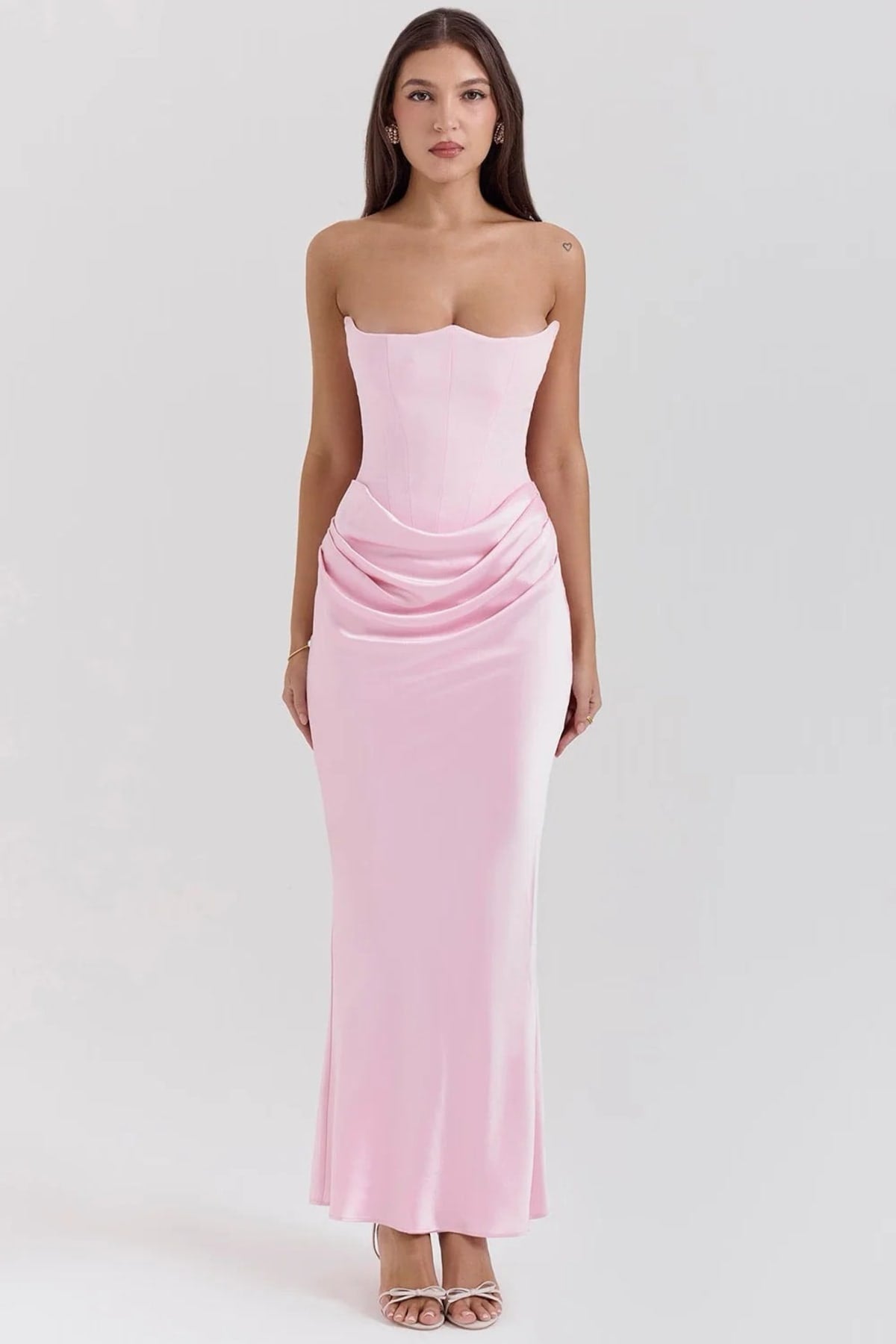 Strapless lace evening dress with flowing skirt, structured bodice.