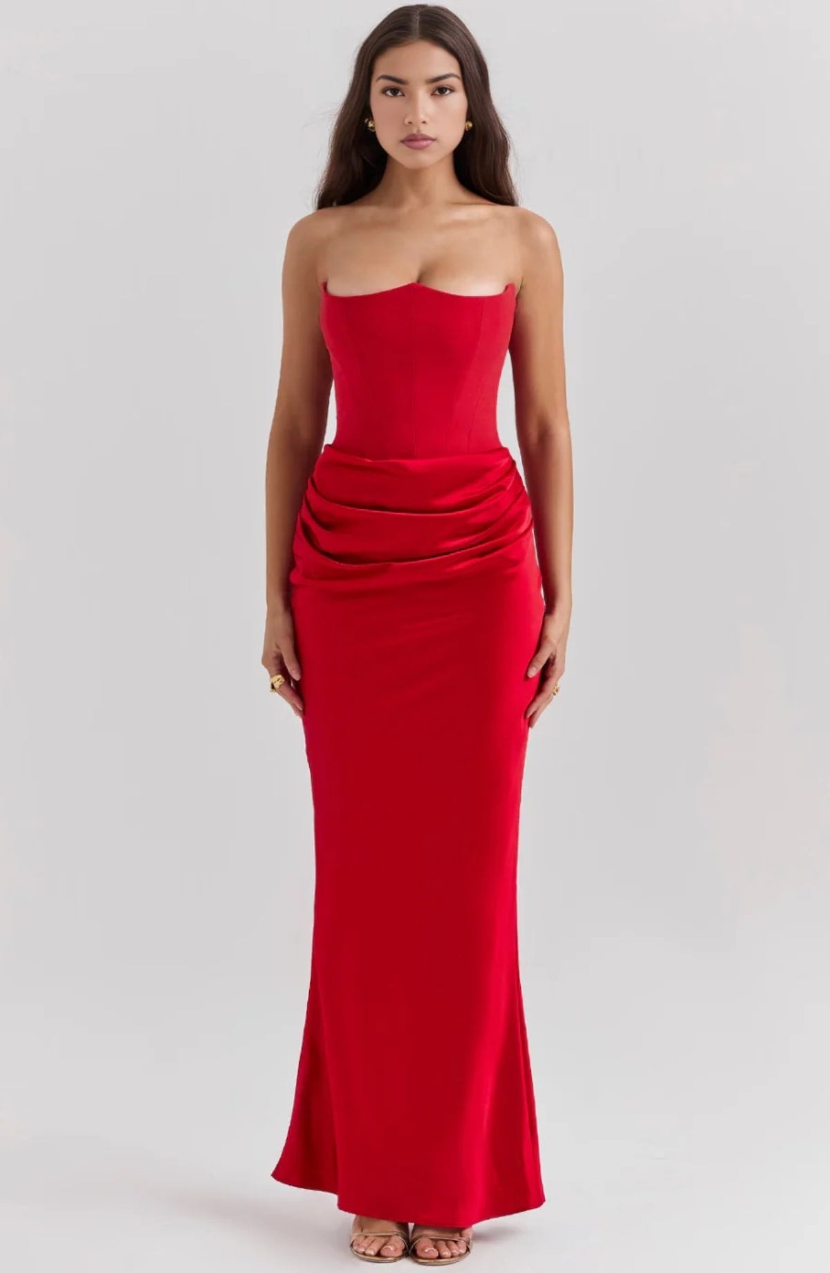 Strapless lace evening dress with flowing skirt, structured bodice.