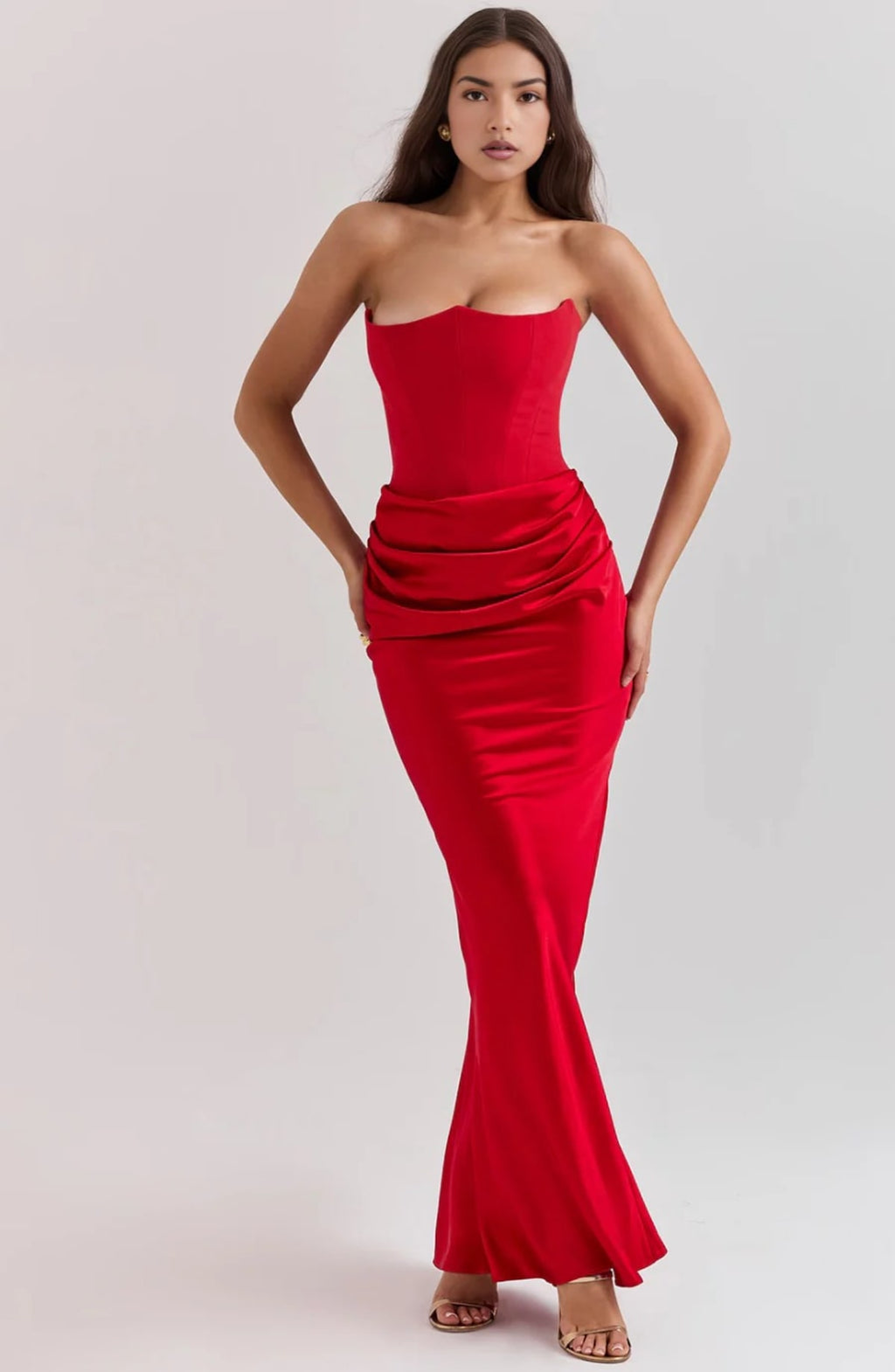 Strapless lace evening dress with flowing skirt, structured bodice.