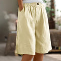 Elastic waistband shorts, relaxed fit, mid-thigh length.
