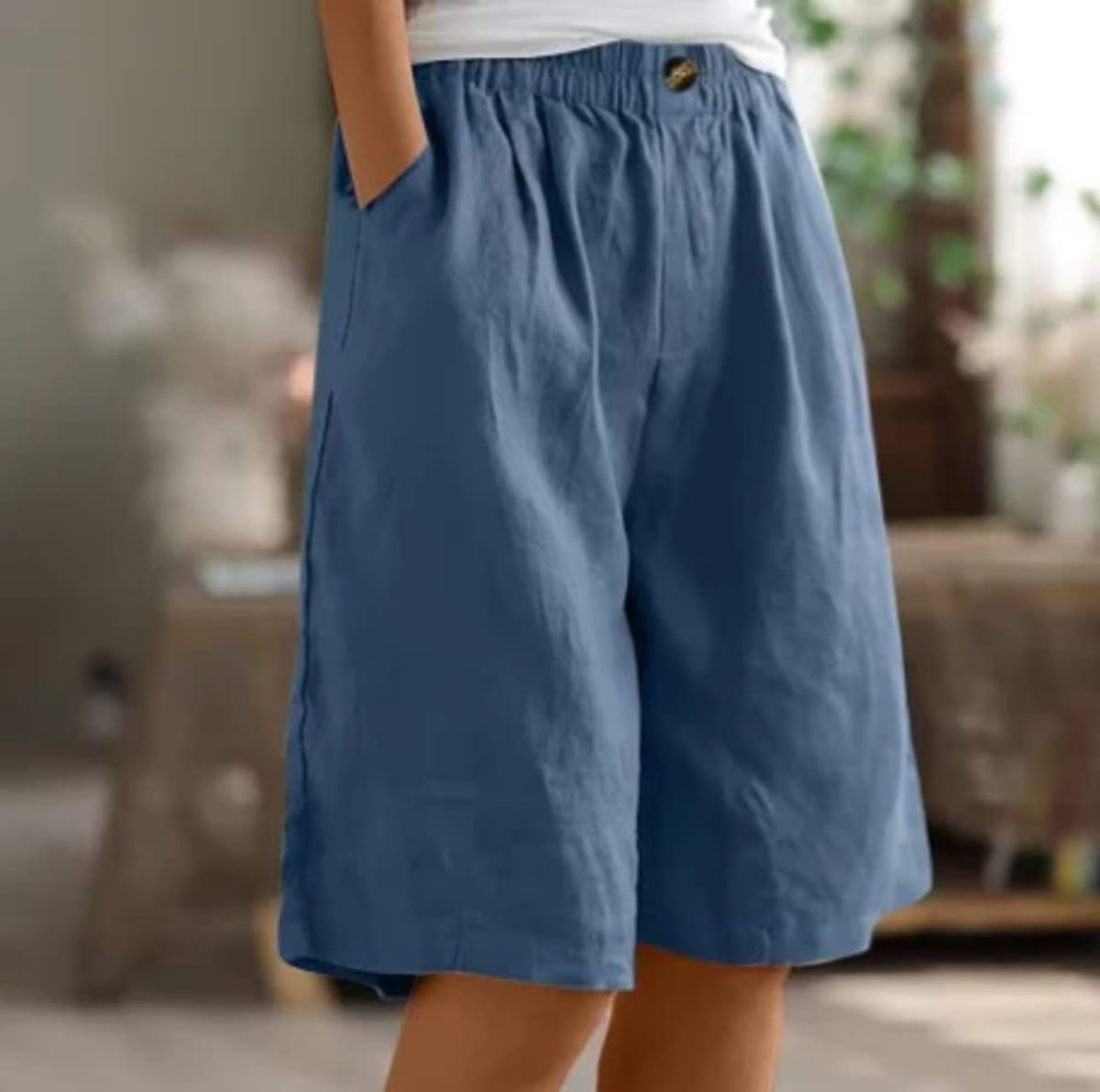 Elastic waistband shorts, relaxed fit, mid-thigh length.