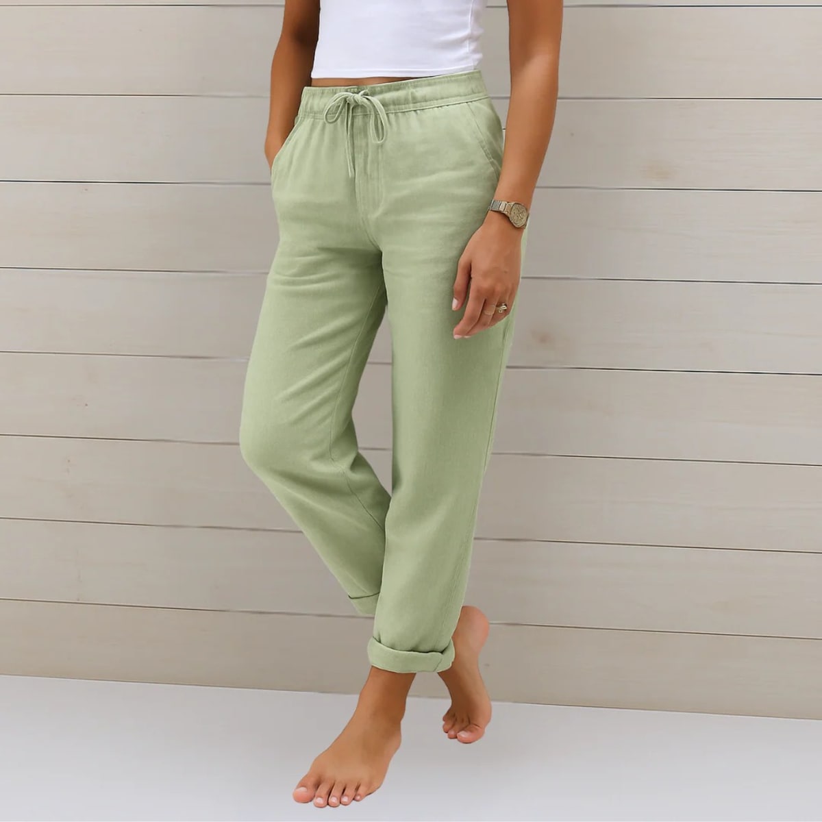 Elastic waist pants with relaxed fit, suitable for casual wear.