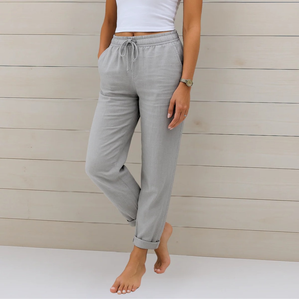 Elastic waist pants with relaxed fit, suitable for casual wear.