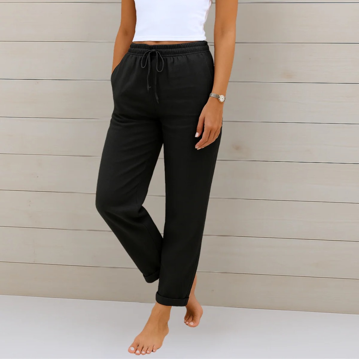 Elastic waist pants with relaxed fit, suitable for casual wear.