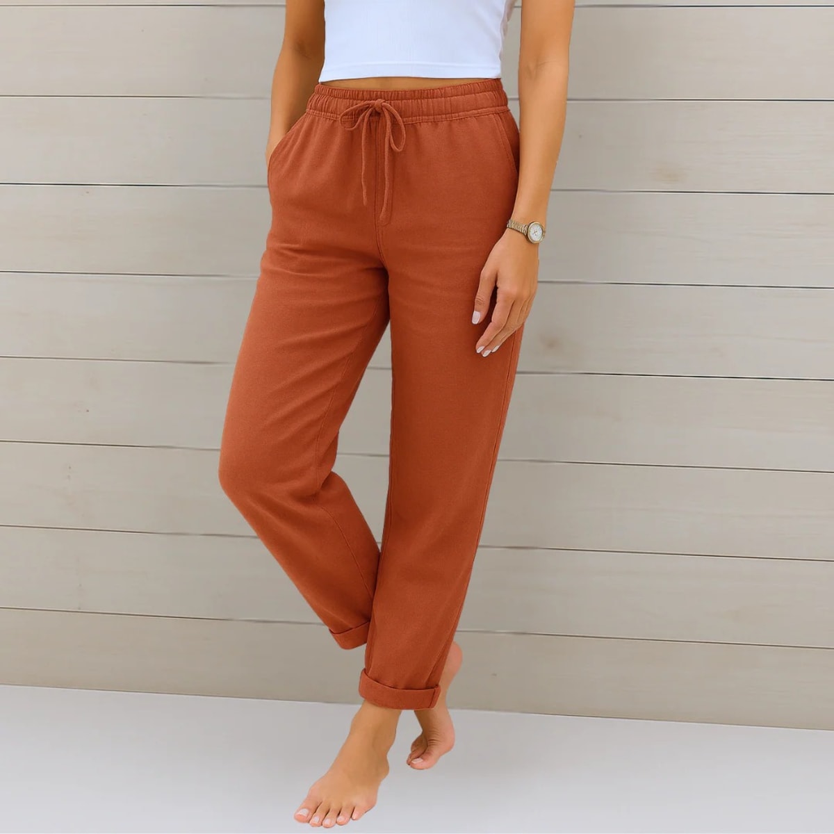Elastic waist pants with relaxed fit, suitable for casual wear.