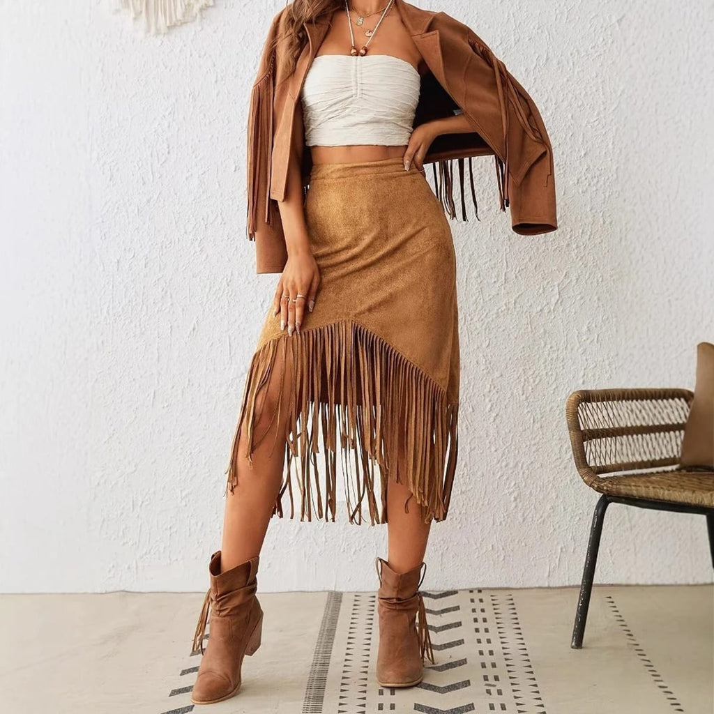 Woman wearing a midi skirt with fringe trim and asymmetrical hem.