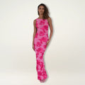 Maxi dress with floral print, flowing silhouette, event-ready.
