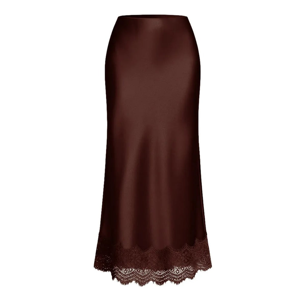 Woman modeling a two-piece crop top and maxi skirt set with lace hem.