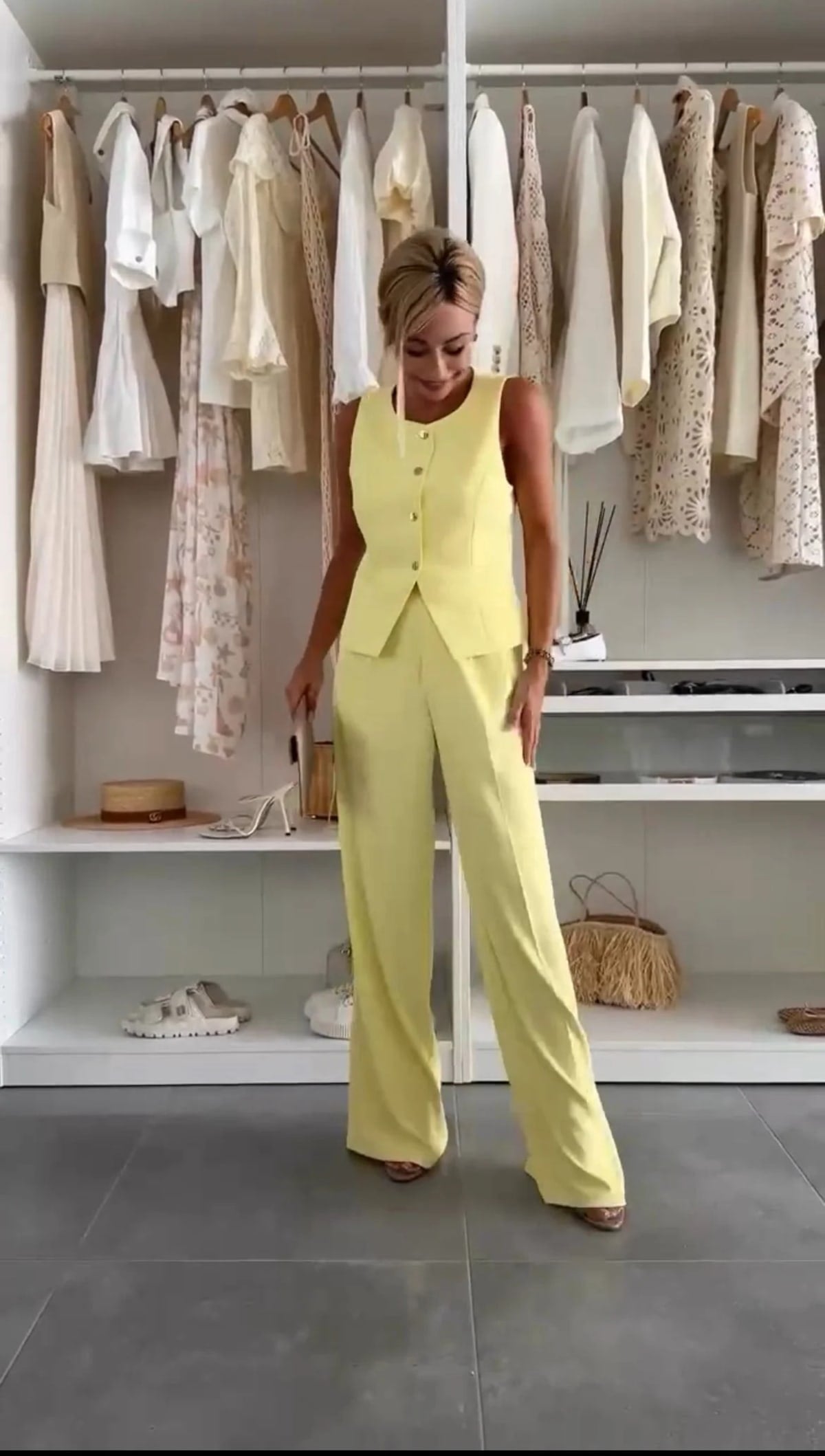 Two-piece button-up co-ord set with matching pants for women.