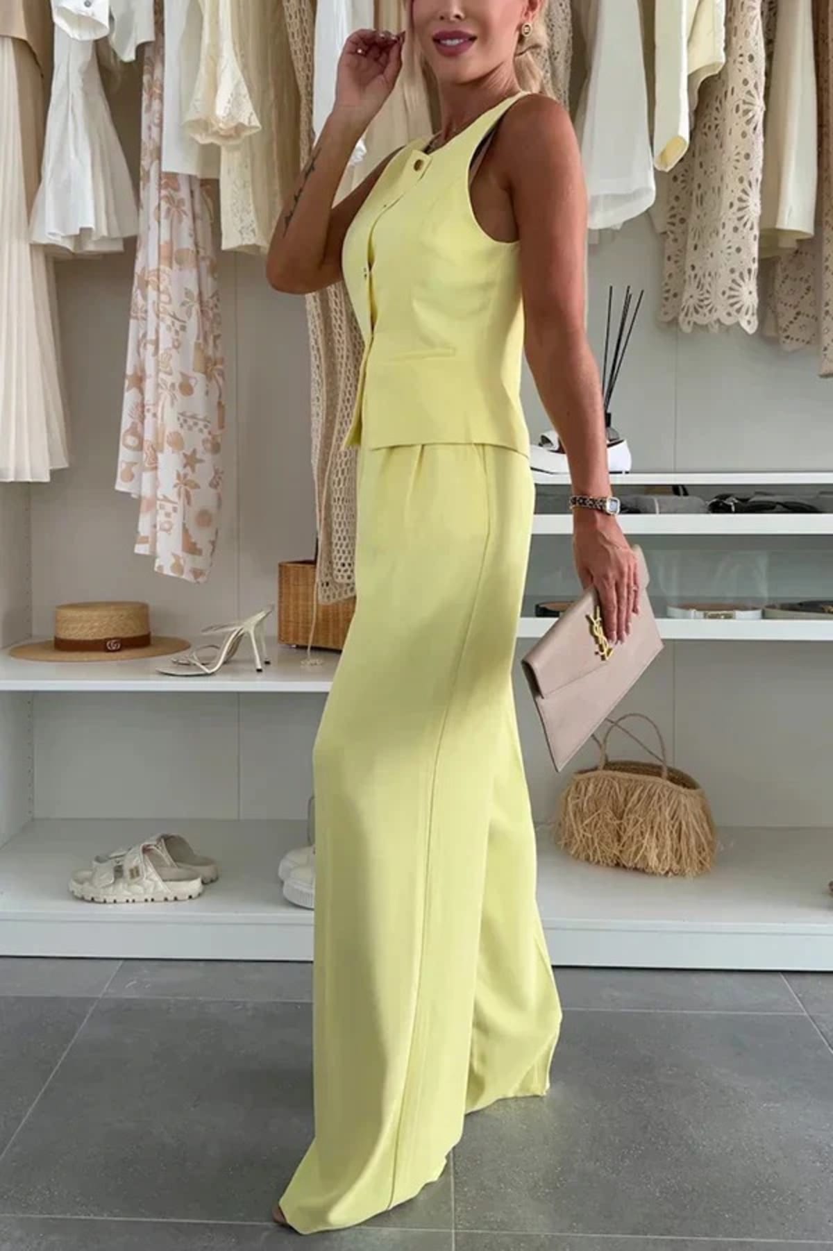 Two-piece button-up co-ord set with matching pants for women.