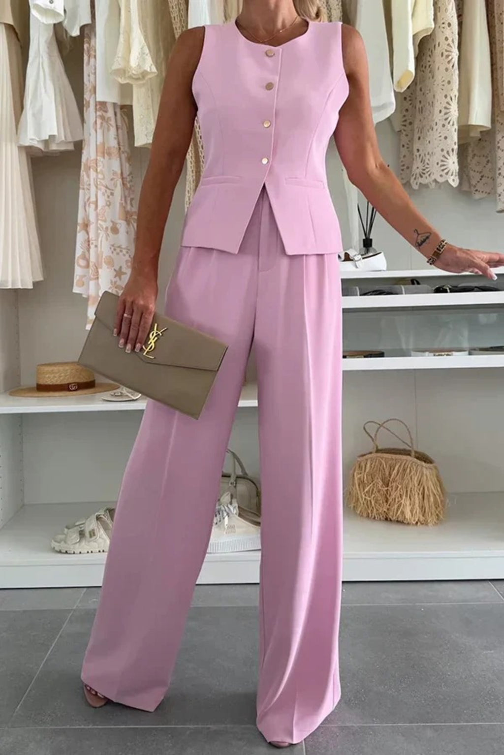 Two-piece button-up co-ord set with matching pants for women.