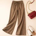 Relaxed drawstring pants with a loose fit and deep pockets.