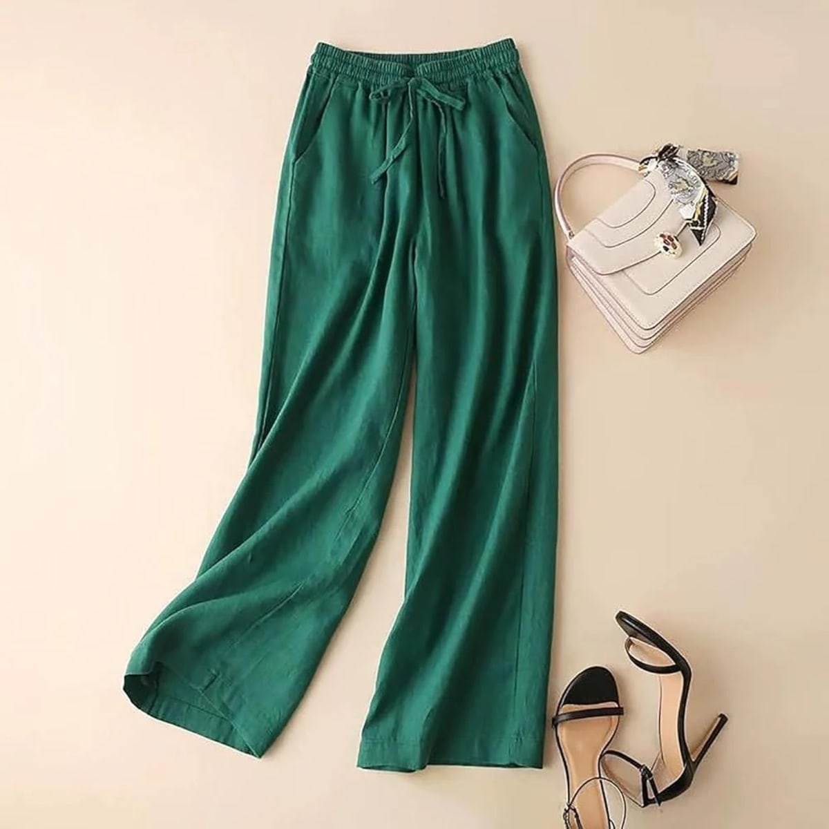 Relaxed drawstring pants with a loose fit and deep pockets.