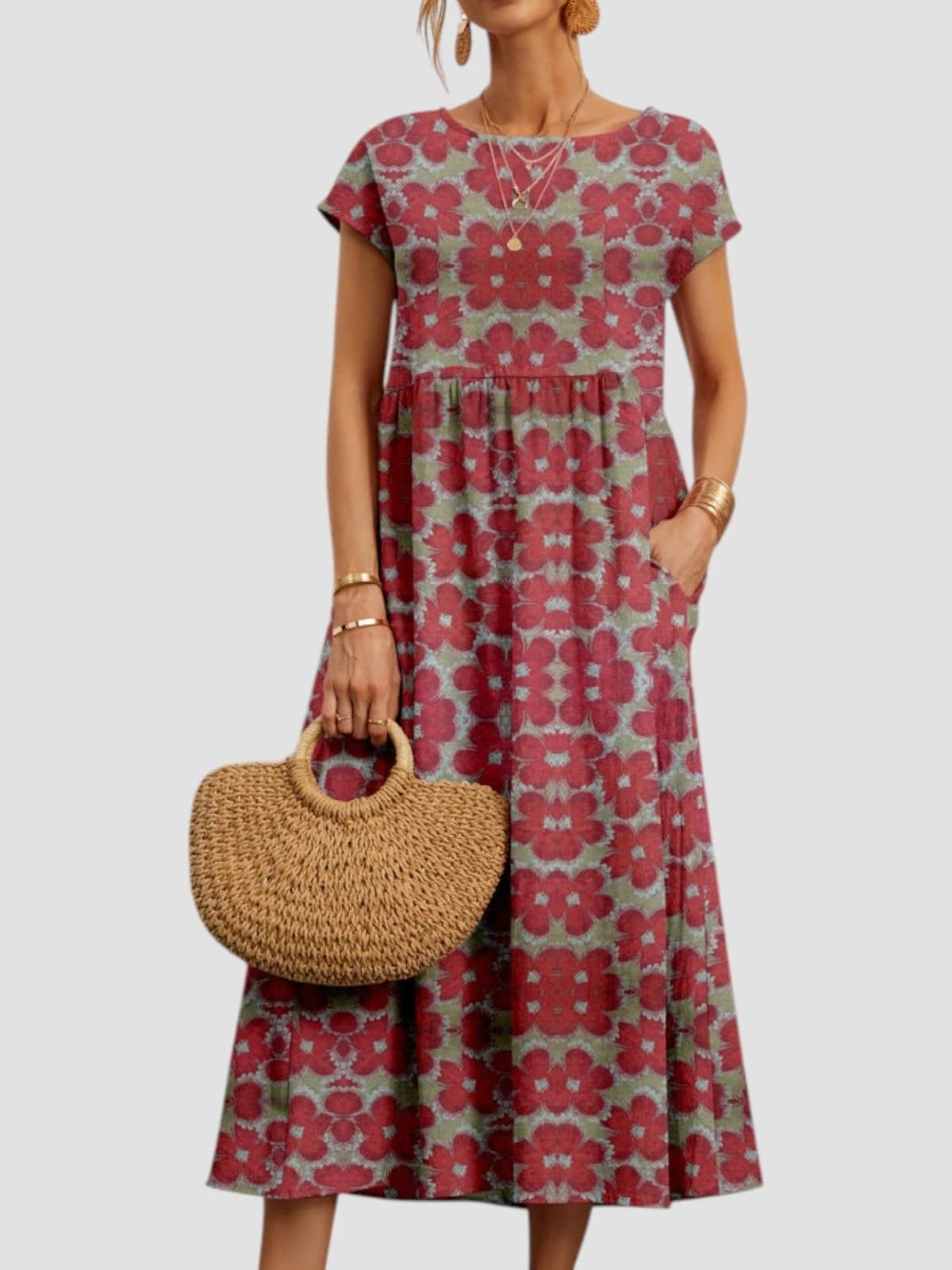 Vintage-inspired floral maxi dress with flowing silhouette.