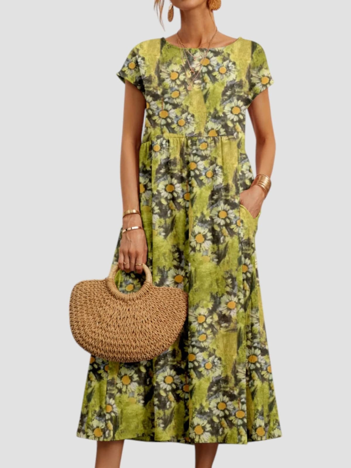 Vintage-inspired floral maxi dress with flowing silhouette.