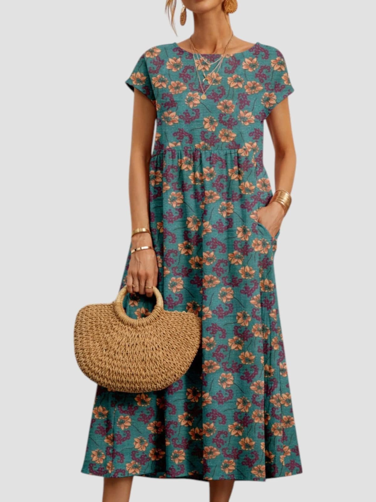 Vintage-inspired floral maxi dress with flowing silhouette.