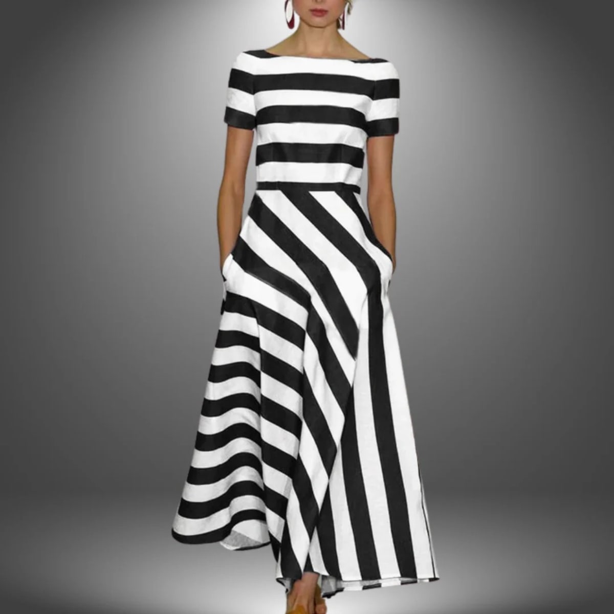 Handcrafted striped maxi dress with relaxed fit and full length.