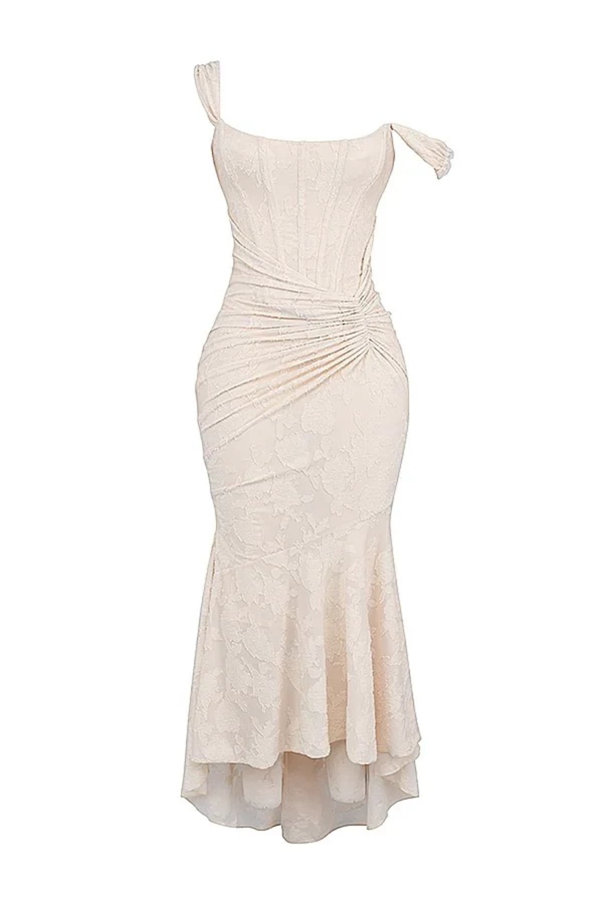 Woman in light blue dress with corset bodice, high-low hem.
