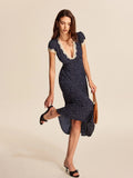 Lace trim polka dot midi dress with cap sleeves and V-neckline.