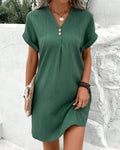 V-neck dress with layers and floral design for spring occasions.