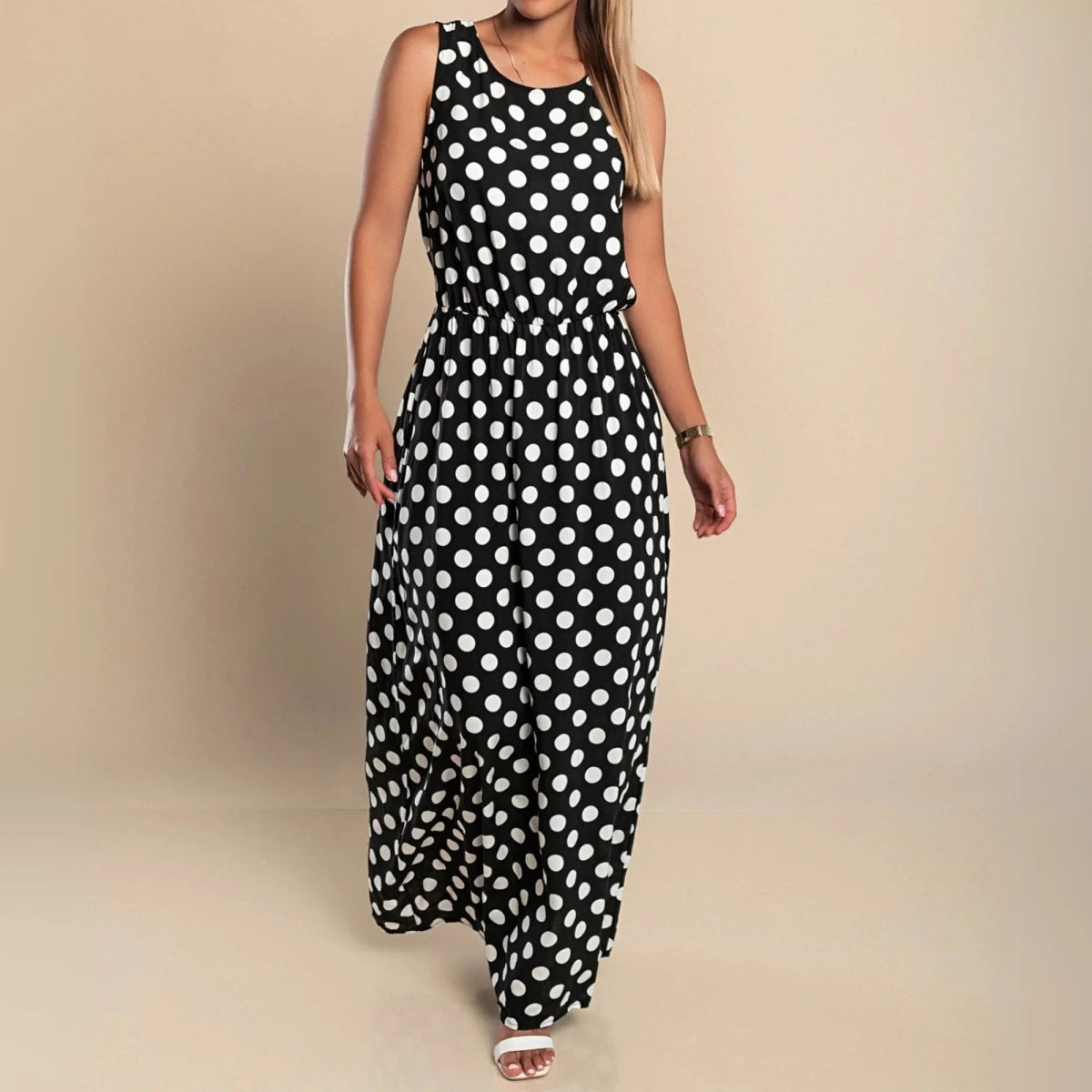 A maxi dress with polka dots and a flowing silhouette.