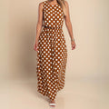 A maxi dress with polka dots and a flowing silhouette.
