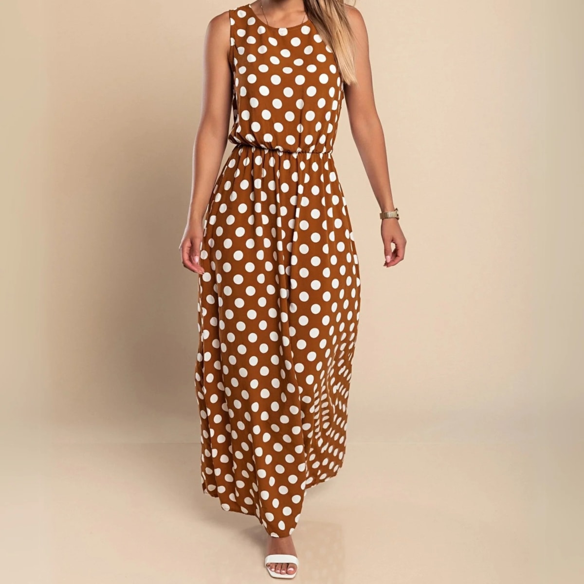 A maxi dress with polka dots and a flowing silhouette.