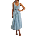Sleeveless denim dress with button-front and defined fit.