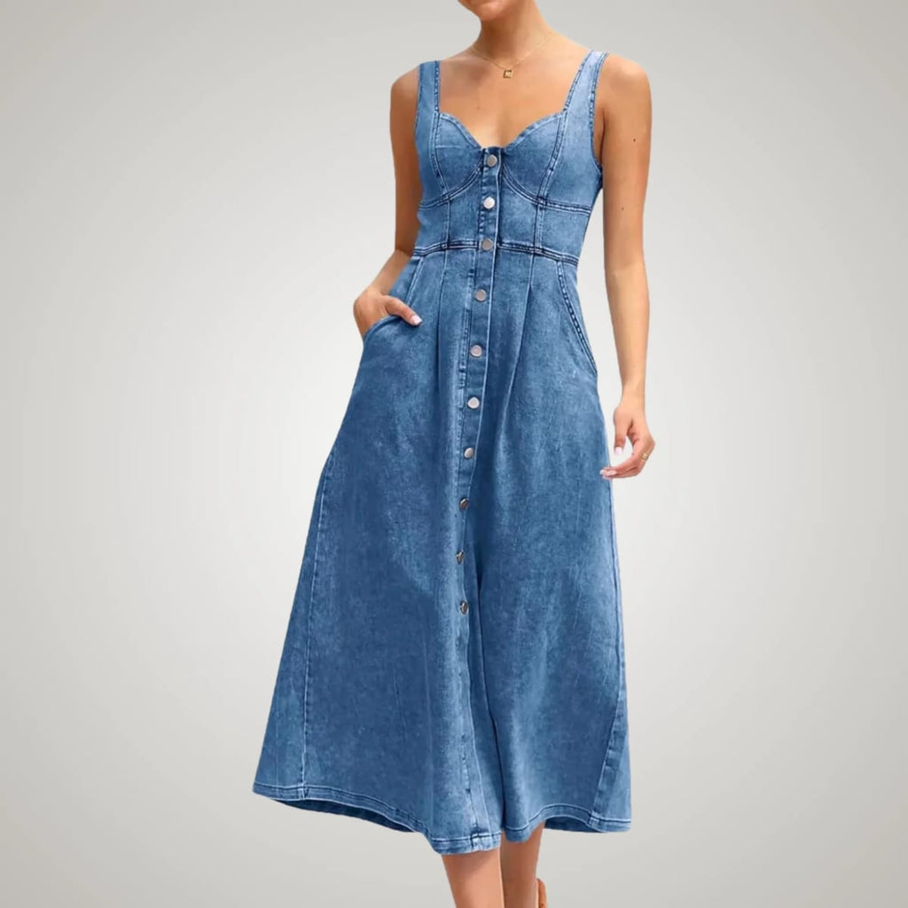 Sleeveless denim dress with button-front and defined fit.