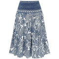 White tiered maxi skirt with blue paisley print and shirred waist.