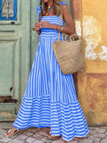 Striped summer dress with ruffle hem and tailored bodice.