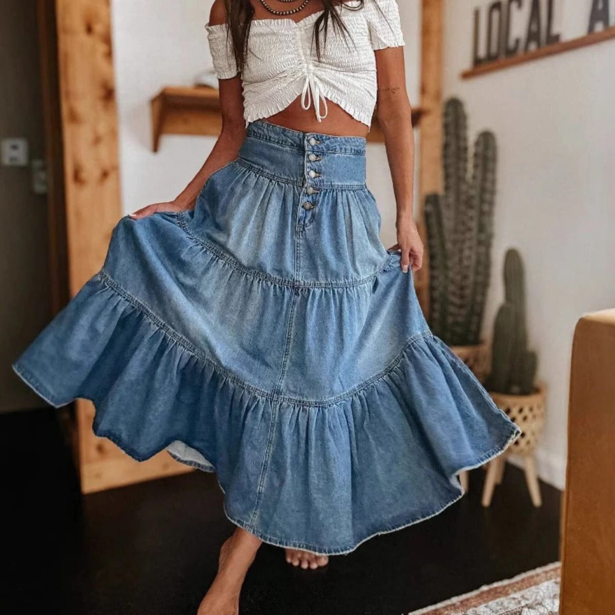 Light blue tiered maxi skirt, high-waisted, button-front.