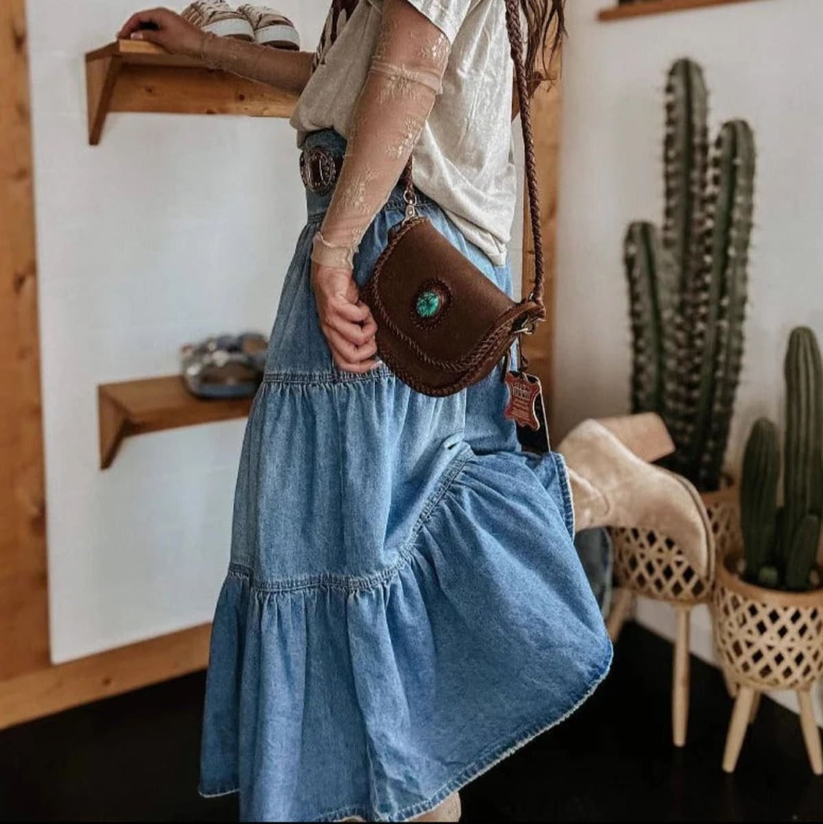 Light blue tiered maxi skirt, high-waisted, button-front.