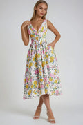 Lightweight summer dress with flowing silhouette and soft structure.
