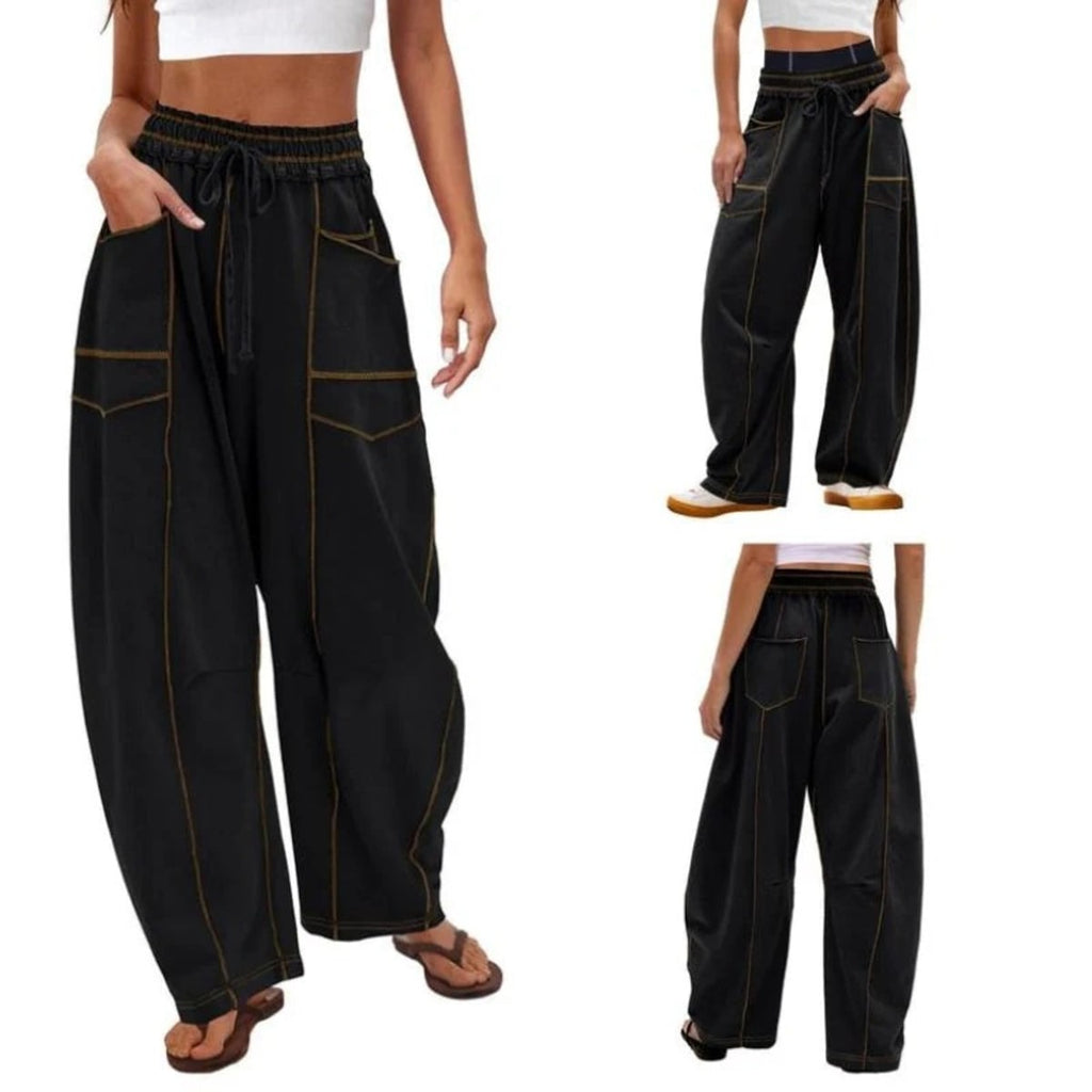 Wide-leg cargo pants with drawstring waist and patch pockets.