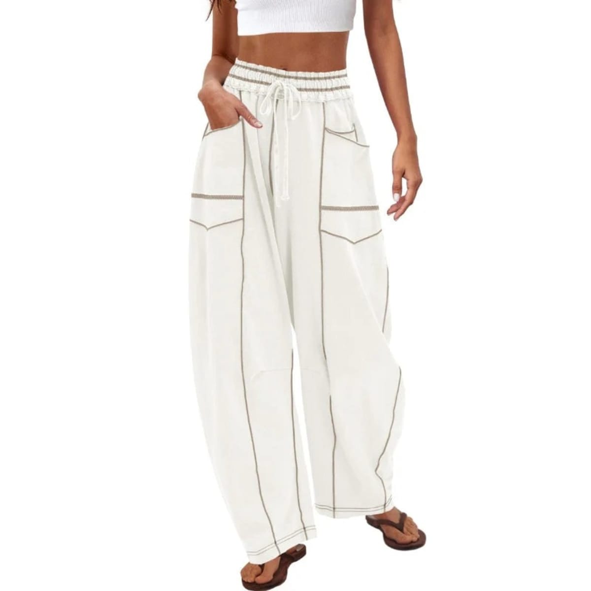 Wide-leg cargo pants with drawstring waist and patch pockets.