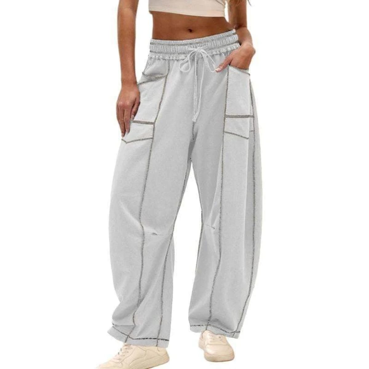 Wide-leg cargo pants with drawstring waist and patch pockets.