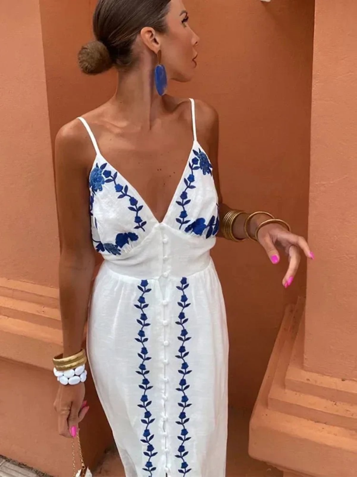 A flowing dress with a relaxed fit for weddings or summer events.