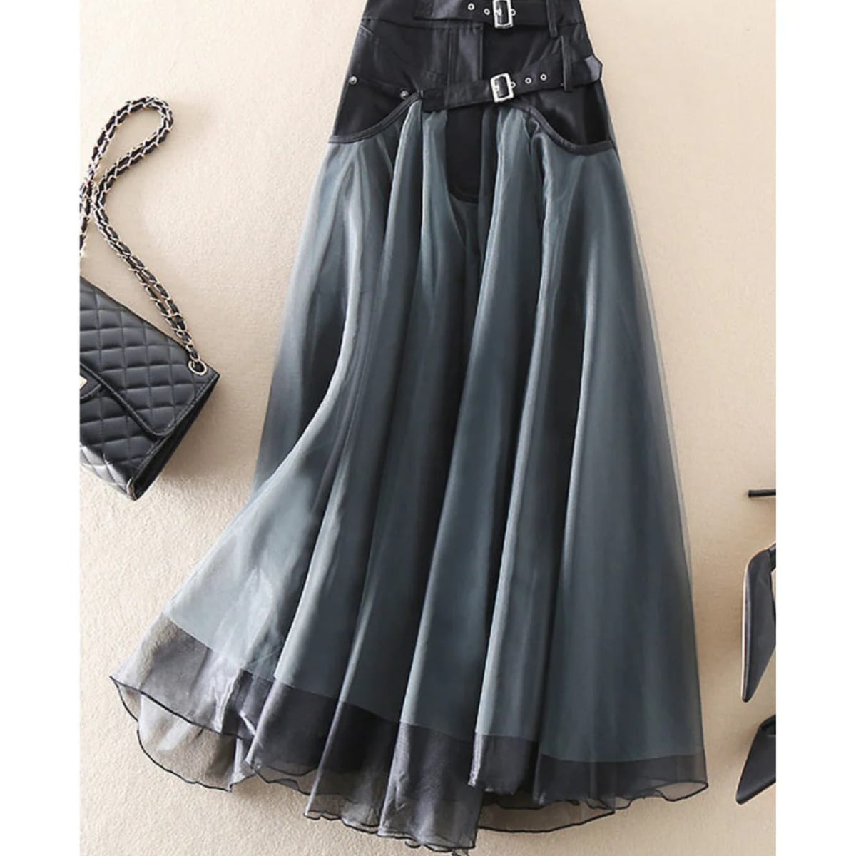 Women's layered maxi skirt with faux leather waistband and tulle.