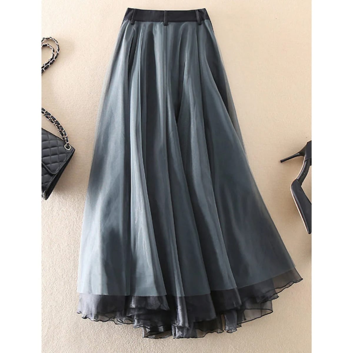 Women's layered maxi skirt with faux leather waistband and tulle.