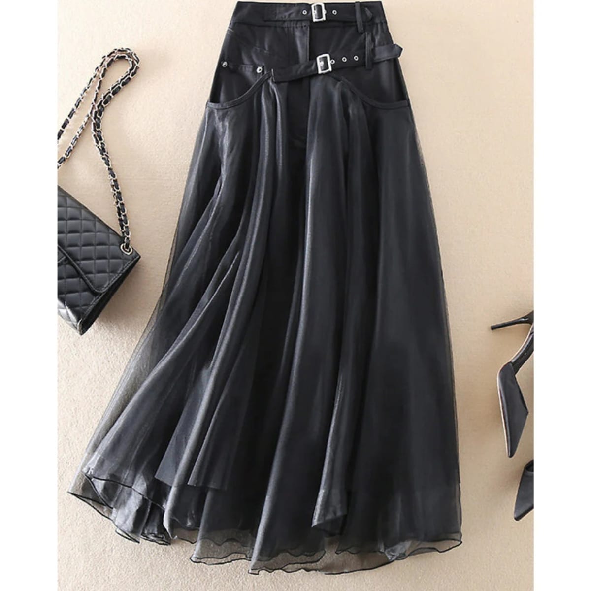 Women's layered maxi skirt with faux leather waistband and tulle.