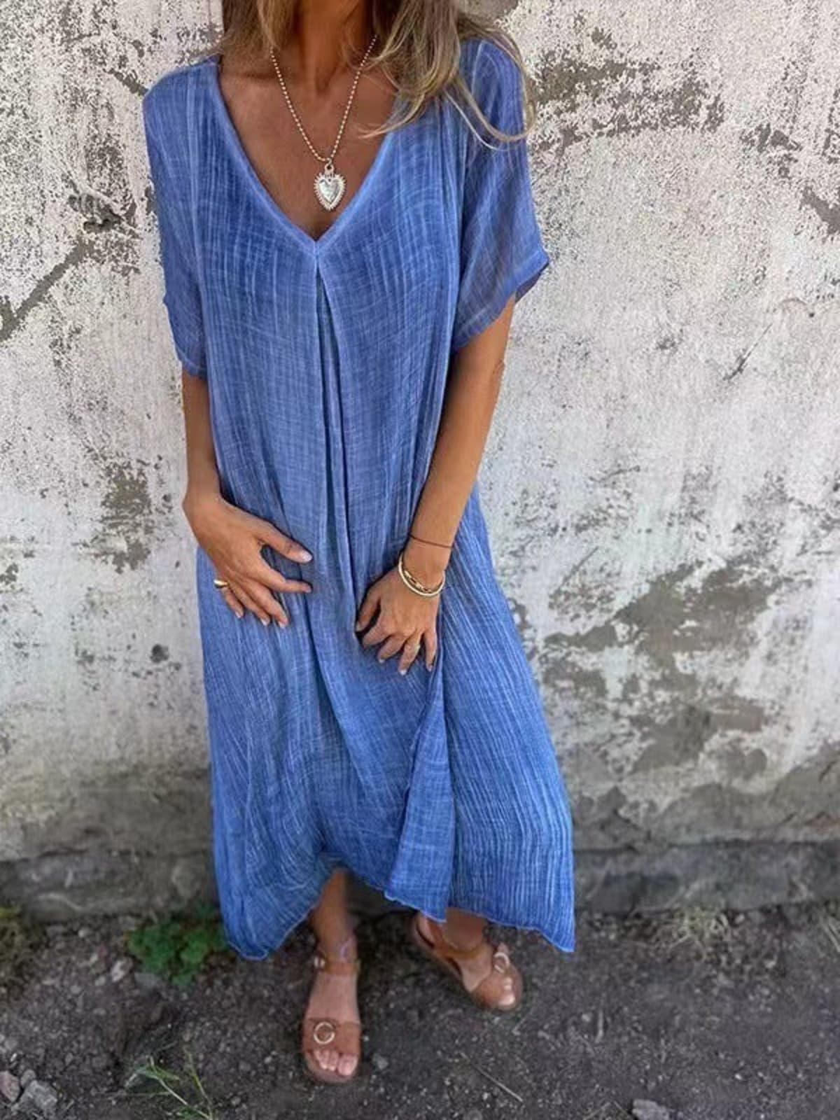 Loose V-neck dress with flowy silhouette and soft fabric