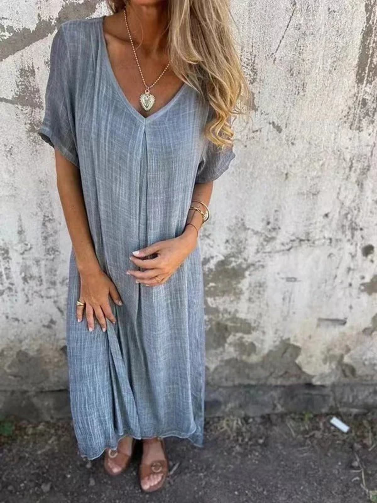 Loose V-neck dress with flowy silhouette and soft fabric