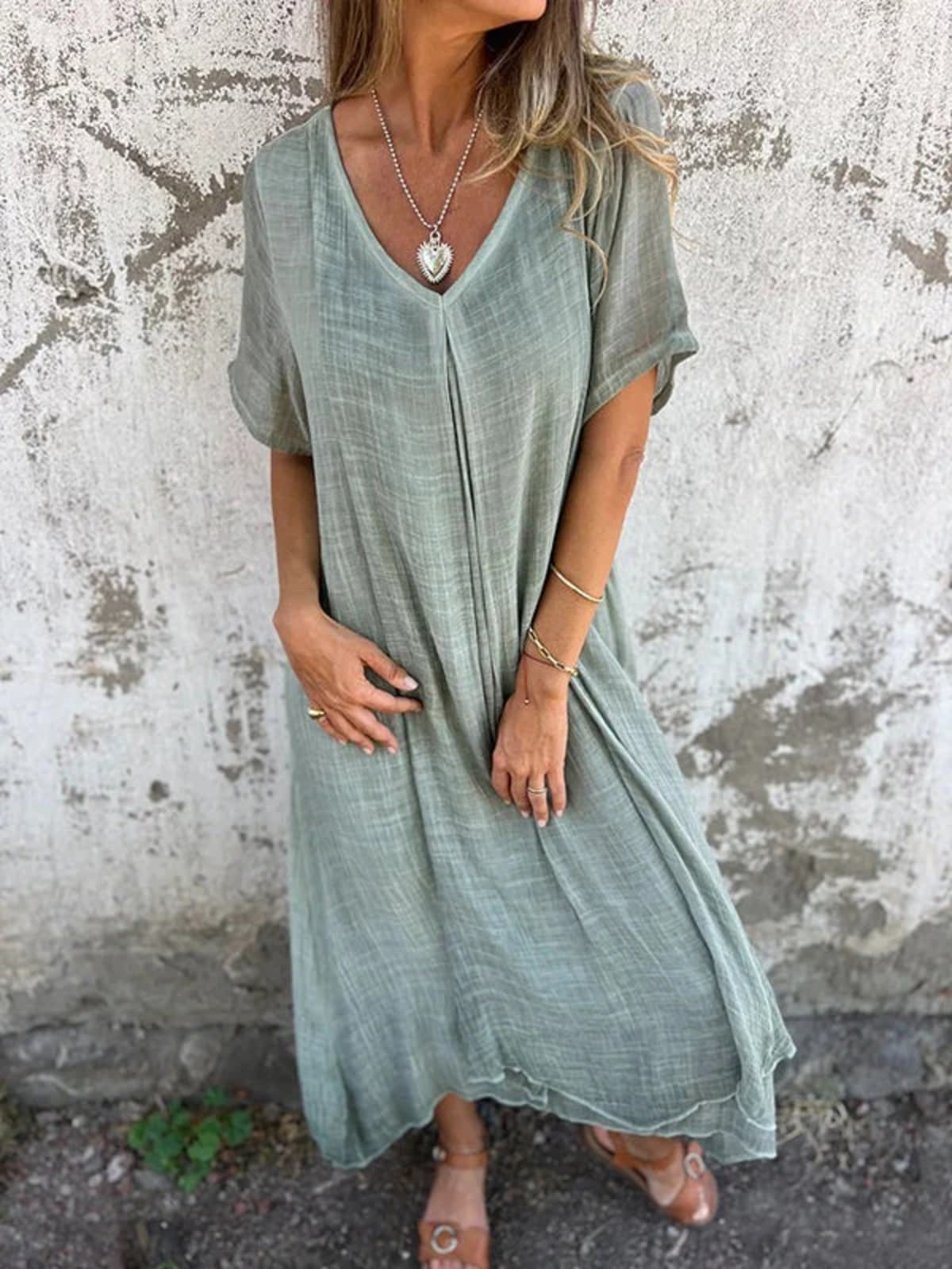 Loose V-neck dress with flowy silhouette and soft fabric